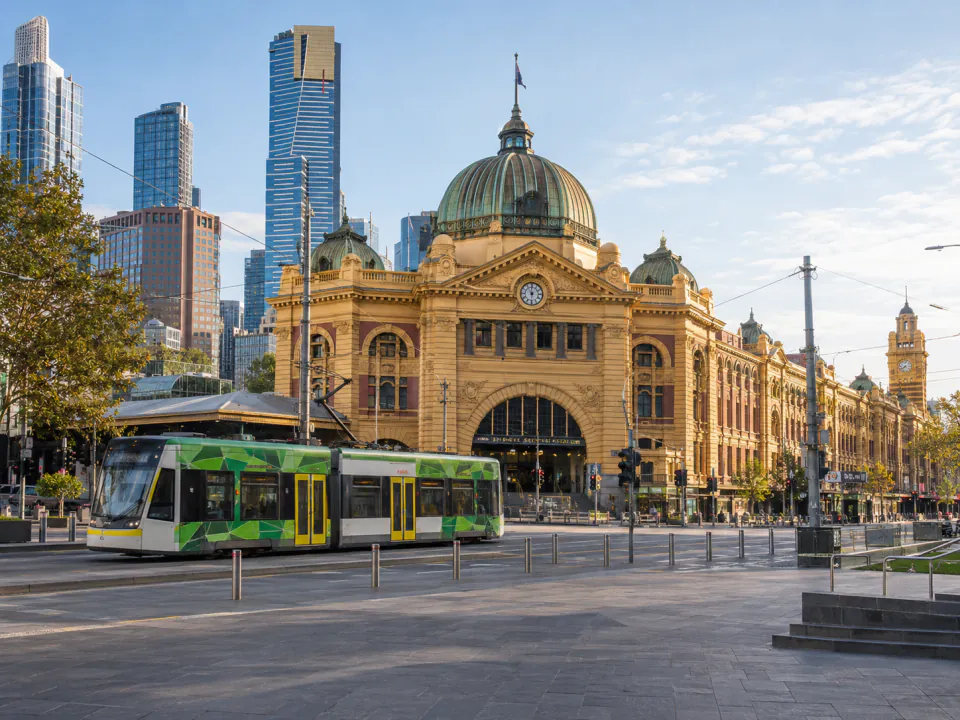 Melbourne cityscape with Flinders Street Station and a tram